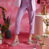 Step out in fashion with lilac leather platform sandals."
