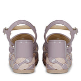 Step out in fashion with lilac leather platform sandals."