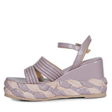 Step out in fashion with lilac leather platform sandals."