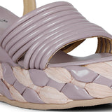 Step out in fashion with lilac leather platform sandals."