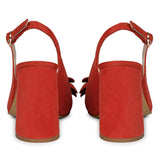 Red suede leather heels with floral embellishments - Saint Naiya's elegant statement footwear