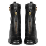 Sleek Saint Henriette Black Leather High Ankle Boots with Front Zipper - Stylish and versatile footwear for a bold fashion statement