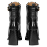 Sleek Saint Henriette Black Leather High Ankle Boots with Front Zipper - Stylish and versatile footwear for a bold fashion statement