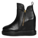 Black Leather Ankle Boots Featuring Stylish Wedge Heel Design