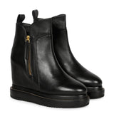 Black Leather Ankle Boots Featuring Stylish Wedge Heel Design