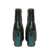 Metallic leather high ankle boots with a sleek and stylish design